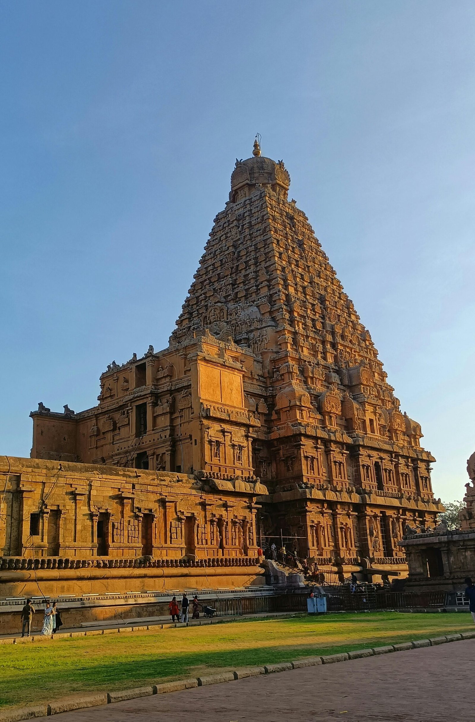 Stunning view of Brihadeeswarar Temple in Thanjavur during golden sunset.